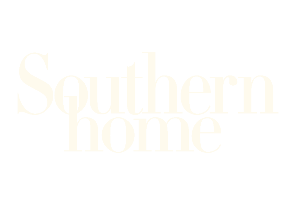 Text reads “Southern home” in large, light-colored serif letters on a plain, light gray background. The text is centered and spans most of the image, evoking the understated elegance of custom window treatments and classic Southern soft furnishings.